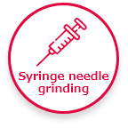 Syringe needle grinding